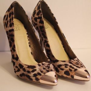 Leopard gold cap toe pumps